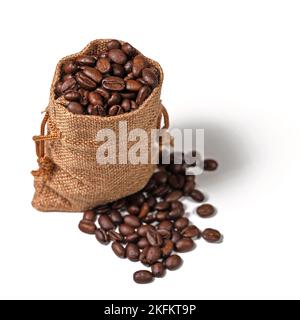 Roasted coffee beans in a jute sack Stock Photo