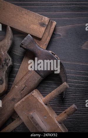 Antique hand saw wooden marking gage claw hammer square ruler. Stock Photo