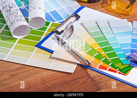 color  palettes on wooden table Stock Photo
