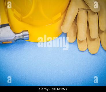 Claw hammer building helmet blue rolled blueprints construction level ...