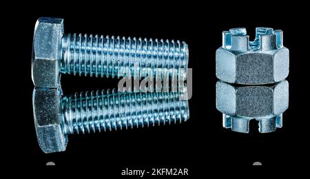 Construction crown nuts bolts on black background horizontal view. Stock Photo