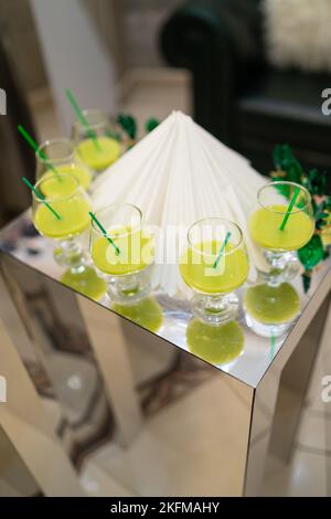glasses of mojito and bar accessories. Mojito cocktail on a gray background. Cocktail with lime and mint Stock Photo