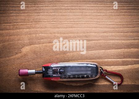 Replaceable screwdriver bits in toolbox on wooden board construction concept. Stock Photo