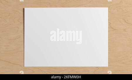 Blank sheet of paper mock up on the wooden table Stock Photo