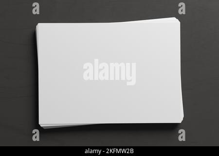 Stack of paper mockup on the black background Stock Photo