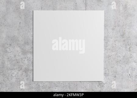 Square sheet of paper on the concrete background Stock Photo