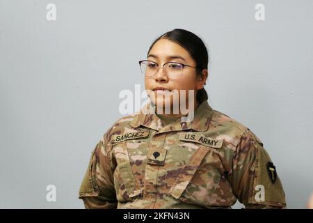 U.S. Army Spc. Jennifer M. Sanchez, Property Book NCO, 92Y, for Headquarters and Headquarters Company, 36th Combat Aviation Brigade, 'Task Force Mustang,' 36th Infantry Division, receives Certificate of Appreciation as the brigade's 'Hero of the Week' during a command and staff meeting held at Task Force Mustang headquarters, Camp Buehring, Kuwait, Sept. 28, 2022. Sanchez, a native of Nacogdoches, Texas, was recognized for her stellar performance and administrative excellence in overseeing quality control measures for the brigade's monthly inventory audits. Stock Photo