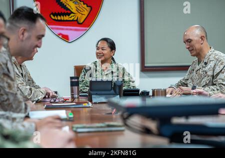 NSA Bahrain - U.S. Navy Capt. Joanna Sarmiento, the Deputy Commander of Naval Amphibious Force, Task Force 51/5th Marine Expeditionary Brigade (TF51/5),  conducts the Operations and Intelligence Brief at TF51/5 September 28, 2022. Capt. Sarmiento is one of dozens of reserve Sailors who have deployed to in support of TF 51/5 over the years. TF 51/5 responds to crises and contingencies; coordinates, plans, and executes operations; conducts theater security cooperation; and advances emerging Naval concepts at sea, from the sea, and ashore in order to support CENTCOM, 5th Fleet, and Marine Corps F Stock Photo