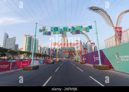 Tourist and football fans in Doha corniche during FIFA World Cup 2022 Qatar. Stock Photo