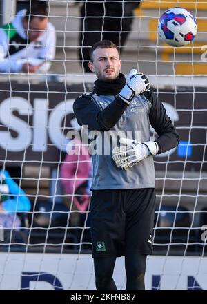 Plymouth Argyle goalkeeper Callum Burton  (25) warming up during the Sky Bet League 1 match Burton Albion vs Plymouth Argyle at Pirelli Stadium, Burton upon Trent, United Kingdom, 19th November 2022  (Photo by Stanley Kasala/News Images) Stock Photo