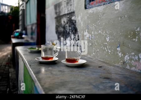 empty two glass cup of tea in traditional cafe called warung in Kediri, East java, Indonesia Stock Photo