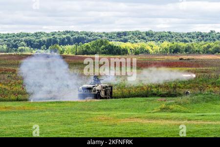 Indiana National Guard infantrymen with Company D, 1st Battalion, 151st Infantry Regiment, fire missiles during a live-fire exercise at Camp Atterbury, Indiana, Wednesday, Sept. 28, 2022. The missiles, which are tube launched, optically tracked and wirelessly guided, also known as TOW, are the most modern and capable missile of that type with an extended maximum range of 4,500 meters. Stock Photo