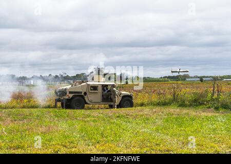 Indiana National Guard infantrymen with Company D, 1st Battalion, 151st Infantry Regiment, fire missiles during a live-fire exercise at Camp Atterbury, Indiana, Wednesday, Sept. 28, 2022. The missiles, which are tube launched, optically tracked and wirelessly guided, also known as TOW, are the most modern and capable missile of that type with an extended maximum range of 4,500 meters. Stock Photo