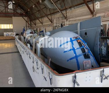 An MQ-9A Reaper with Marine Unmanned Aerial Vehicle Squadron (VMU) 1, Marine Aircraft Group 13, 3rd Marine Aircraft Wing, sits inside of a hangar at Marine Corps Air Station (MCAS) Yuma, Arizona, Sept. 28, 2022. This MQ-9A was deployed to MCAS Miramar, California to demonstrate the ability for 3rd MAW to self-deploy the MQ-9A over long distances to advanced bases. MCAS Yuma,MQ-9 Reaper,Marine Corps Air Station Yuma,USMC,VMGR-352,VMU-1, Stock Photo