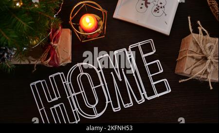 New Year's flatley layout in the evening at night. Christmas canoon at home with a Christmas tree, candles, postcards, handouts, tangerines. Space for text Stock Photo