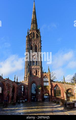 The steeple, now used as a bell tower, from the ruins of the old cathedral.  Coventry, West Midlands, England, UK Stock Photo