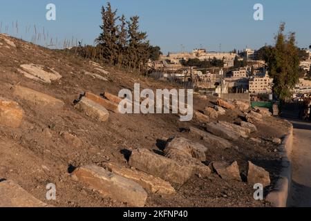 Old Jewish graves in “Sambosky Cemetery” located in Wadi Al-Rababeh in Silwan or Siloam a predominantly Palestinian neighborhood, on the outskirts of the Old City of East Jerusalem. Israel Stock Photo
