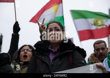 Berlin, Germany. 19th Nov, 2022. Protesters gathered at Potsdamer Platz in Berlin on November 19, 2022, for a large demonstration leading past the Brandenburg Gate to the Federal Chancellery. Many banners were held with the inscription, women, life, freedom. (Photo by Michael Kuenne/PRESSCOV/Sipa USA) Credit: Sipa USA/Alamy Live News Stock Photo