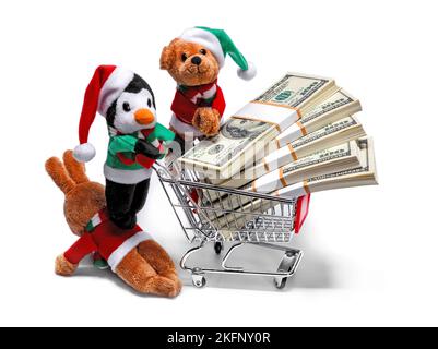 Santa's helpers with a shopping cart full of money. Funny Christmas concept Stock Photo