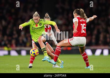 Manchester United's Alessia Russo (left) gets away from Arsenal's Katie McCabe during the Barclay Women's Super League match at the Emirates Stadium, London. Picture date: Saturday November 19, 2022. Stock Photo