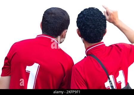 two football fans from Qatar isolated on white background Stock Photo