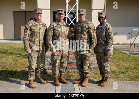 The command team from 311th Signal Command, which included Brig. Gen. Kevin Meisler and Command Sgt. Maj. Jonathan DeHart visited the 41st Signal Battalion and had the opportunity to to recognize and give coins to some soldiers there. Stock Photo