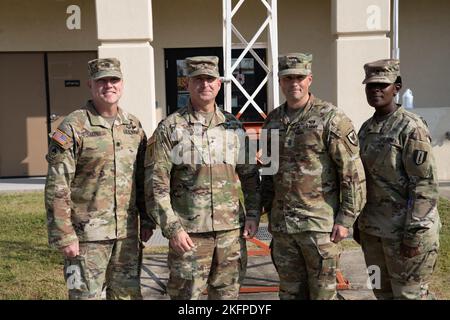 The command team from 311th Signal Command, which included Brig. Gen. Kevin Meisler and Command Sgt. Maj. Jonathan DeHart visited the 41st Signal Battalion and had the opportunity to to recognize and give coins to some soldiers there. Stock Photo