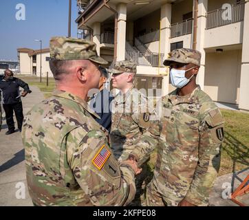 The command team from 311th Signal Command, which included Brig. Gen. Kevin Meisler and Command Sgt. Maj. Jonathan DeHart visited the 41st Signal Battalion and had the opportunity to to recognize and give coins to some soldiers there. Stock Photo