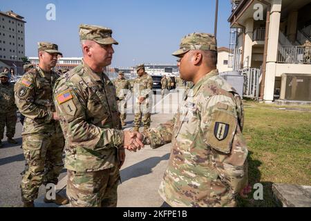 The command team from 311th Signal Command, which included Brig. Gen. Kevin Meisler and Command Sgt. Maj. Jonathan DeHart visited the 41st Signal Battalion and had the opportunity to to recognize and give coins to some soldiers there. Stock Photo