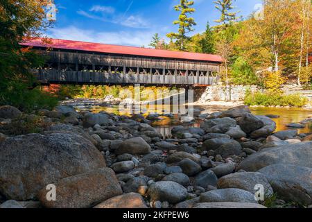 Conway. New Hampshire. USA - October 04, 2022 - View of Albany Covered Bridge over Swift River Stock Photo