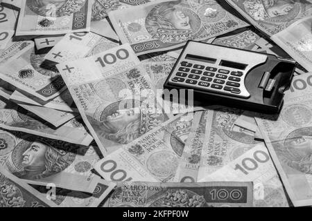 Polish money, PLN with calculator. Black and white photo. Business ...