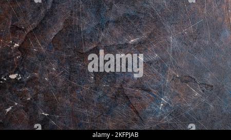 Dark abstract background of scratched surface. Faded paint texture. Grunge surface vintage backdrop Stock Photo