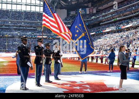 Indiana Army National Guard Honor Guard soldiers present national and state colors during opening ceremonies of the Colts-Titans game, Sunday, Oct. 2, 2022. From left: Pfc. Amara Kaba, Sgt. Nathan Casler, Spc. Kendall Appleton, Spc. Jordan Dickerson. Stock Photo