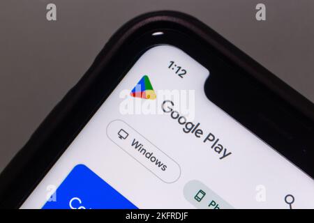 Logo of Google Play Store is seen in smartphone. Google Play, (Google Play Store)  is a digital distribution service operated and developed by Google. Stock Photo