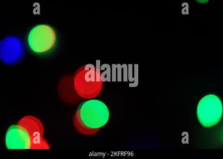 Christmas light on blurred black background Stock Photo