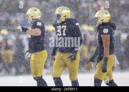 South Bend, Indiana, USA. 19th Nov, 2022. Notre Dame defenders stand in the snow storm during NCAA football game action between the Boston College Eagles and the Notre Dame Fighting Irish at Notre Dame Stadium in South Bend, Indiana. Notre Dame defeated Boston College 44-0. John Mersits/CSM/Alamy Live News Stock Photo