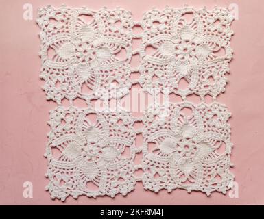 Crochet Motifs On Pink Background Stock Photo