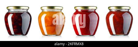 collection of jam in glass jars with metallic lids isolated on white Stock Photo