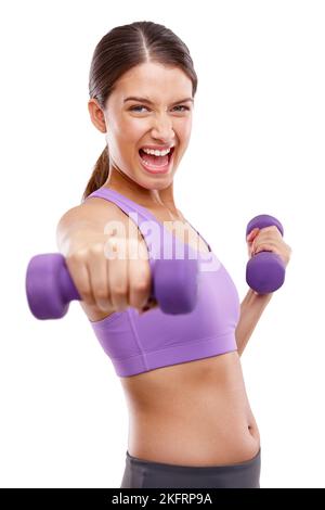 Train like a beast, look like a beauty. Studio portrait of a beautiful young woman lifting dumbbells. Stock Photo