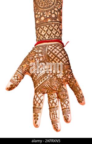 Hindu brides hand painted with henna Stock Photo