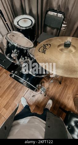 drum kit top view and a young guy without a face Stock Photo