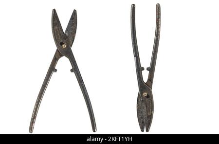 old vintage rusty heavy duty snips tin and metal cutting scissors for straight cut and wire cut. isolated on white background Stock Photo