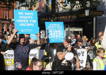 People holding placards aloft demanding rights for the disabled during a Cost of Living Crisis protest. Dublin, Ireland, Europe Stock Photo