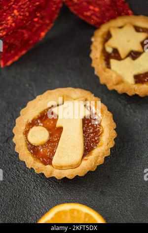 jam tart with christmas decorations Stock Photo