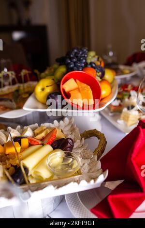 cheese platter on the buffet at the hotel Stock Photo