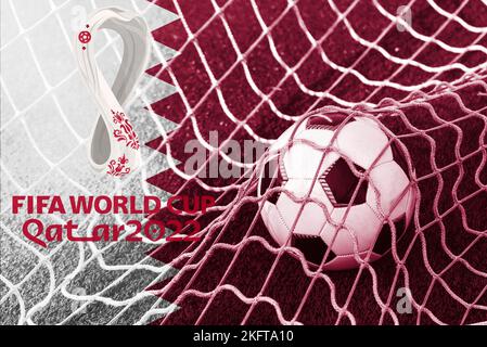 Flags with FIFA and Qatar 2022 World Cup logo waving in the wind. The event is scheduled in Qatar from 21 November to 18 December 2022 Stock Photo