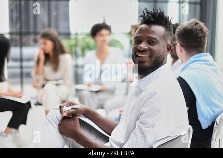 Group of Multi Ethnic Corporate People Interacting with the Speaker Stock Photo