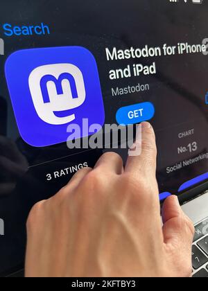 Mastodon app icon on apple appStore. Decentralized alternative to Twitter. Stock Photo