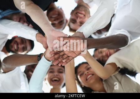 Selfie of young smiling businessmen having fun together Stock Photo