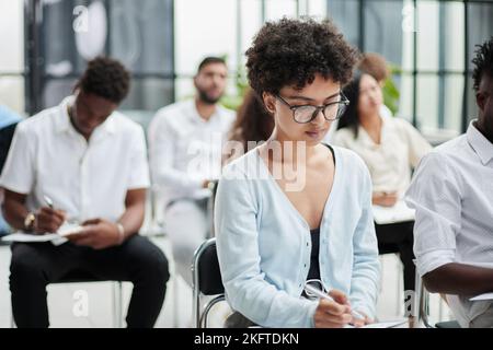 business people attending a seminar in board room. Stock Photo